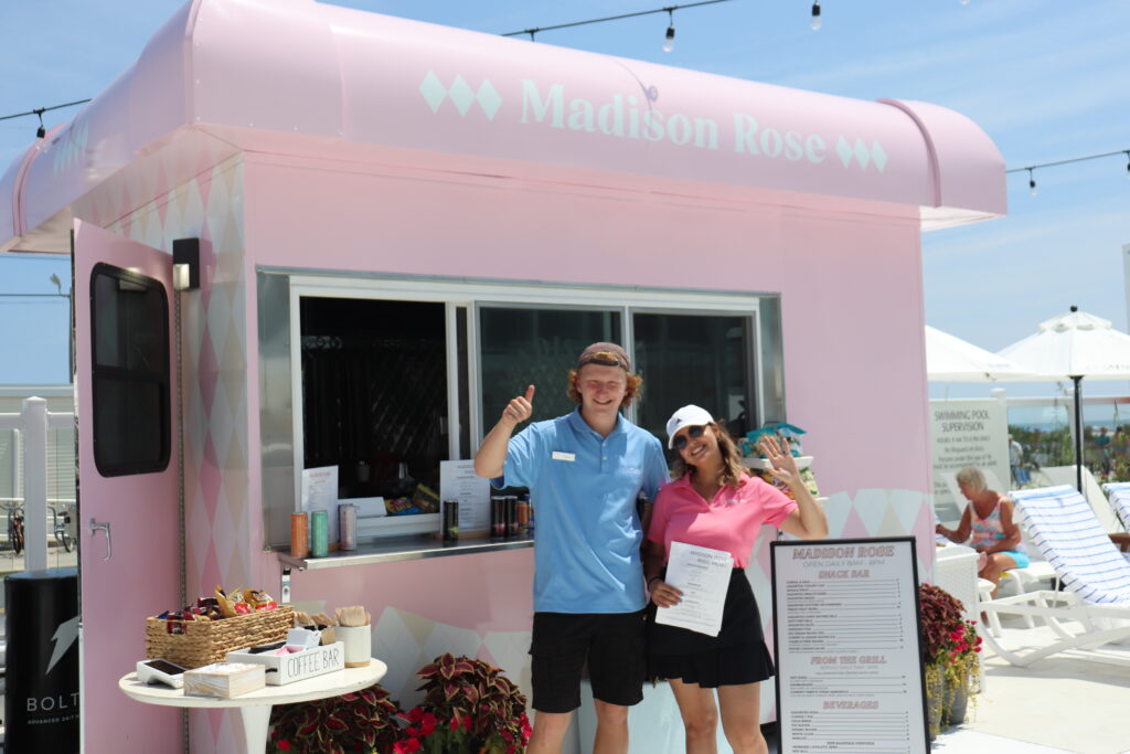 Girl holding madison rose menu